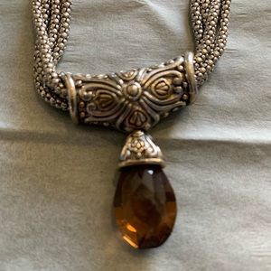 Multi-strand necklace with amber drop and magnetic closure